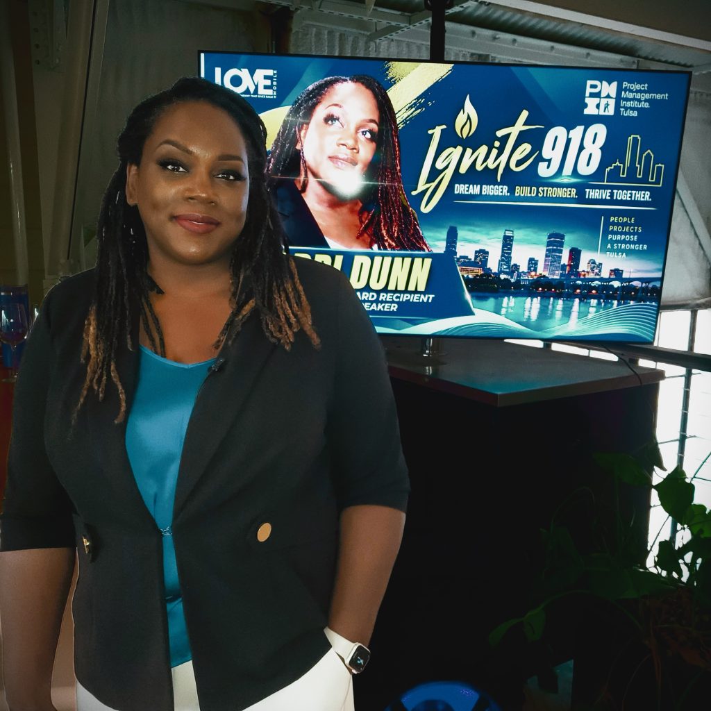 The 2026 Project Tulsa Award presented to Koddi Dunn, Co-Founder and CEO of Love Mobile®, by PMI Tulsa at Ignite 918