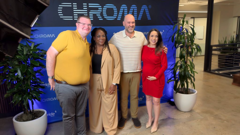 Koddi Dunn with the Startup x Disruption panel in front of the CHROMA 2026 backdrop