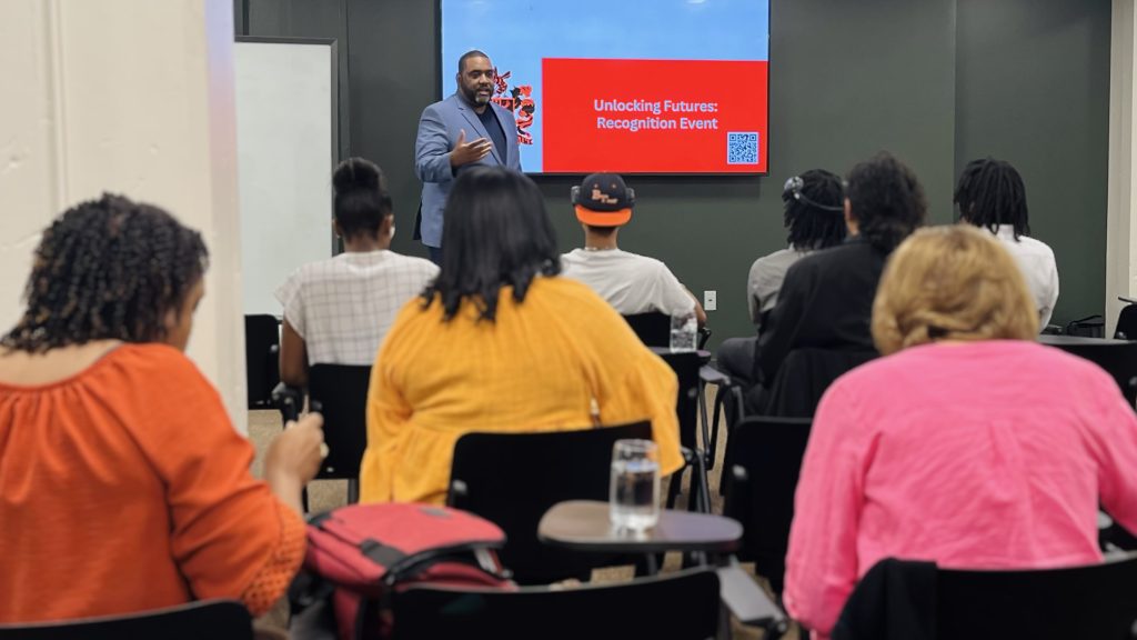 Wade Dunn Jr., co-founder of Love Mobile®, speaking to the community about the Love Mobile® certification program